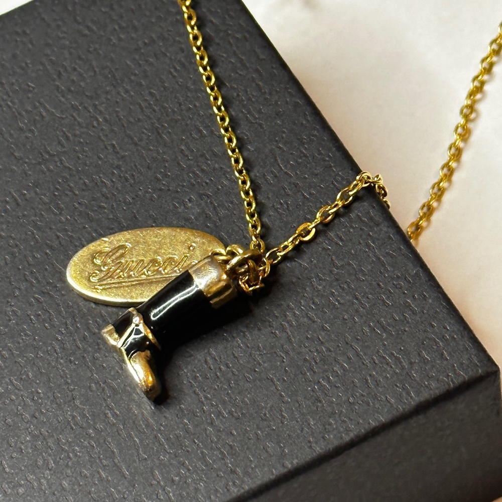 GUCCI upcycled boot and charm necklace